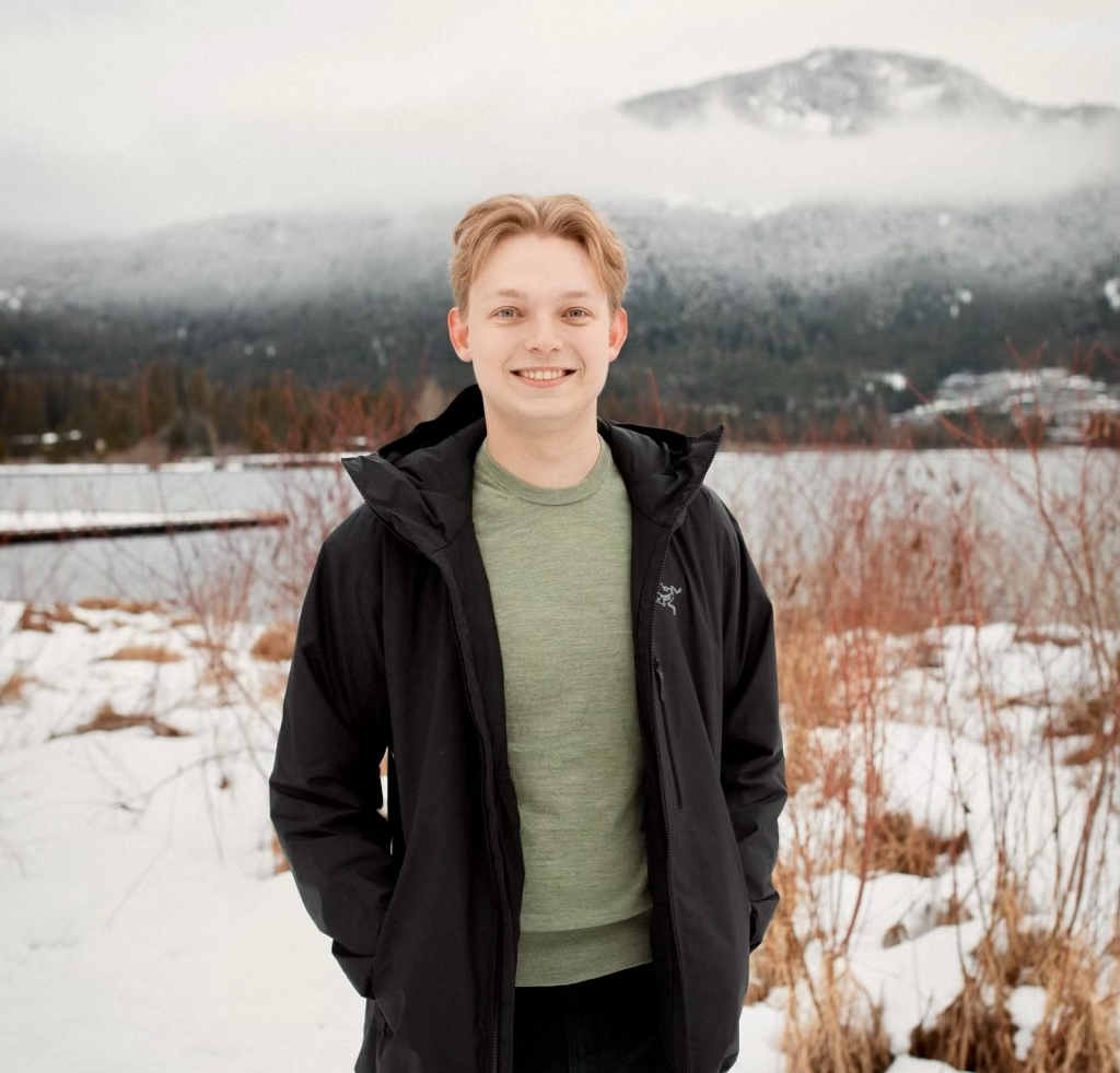 Portrait of Mattias Kroeze in a snowy mountain landscape